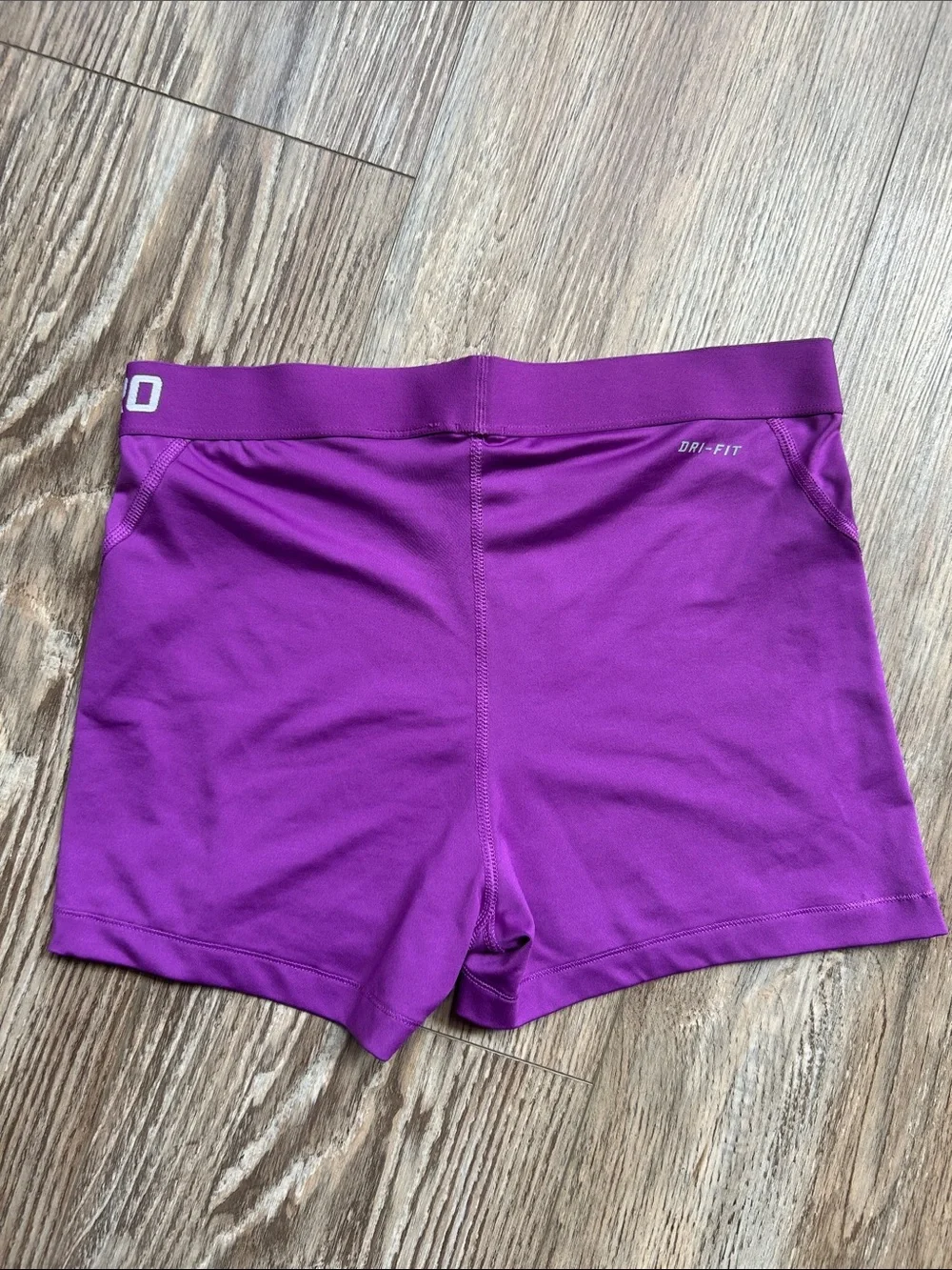 Nike Women's Purple Athletic Bike Shorts with White Swoosh